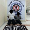 ضبط آسيويان بـ 200 غرام هيروين و300 حبة مخدرة