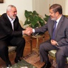 مرسي يعد هنية بمساعدة غزة مرسي يعد هنية بمساعدة غزة