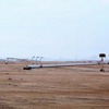 صور / الرياح تقتلع 100 عمود كهرباء