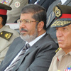 مرسي يتراجع عن قراره ويؤكد احترامه لأحكام القضاء
