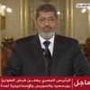 مرسي يهدد بإجراءات لحماية مصر