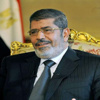 مرسي يضع إكليلا من الزهور على النصب التذكاري للجندي المجهول بمناسبة أعياد سيناء