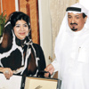النعيمي يكرم عواطف البحر أول رائدة مواطنة في الرعاية الصحية