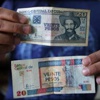 كوبا تتخلى عن نظام العملة الثنائي