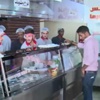 السوريون يتدبرون أمورهم بالسودان رغم الغلاء