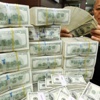 دعوات لإطلاق حوار يكسر هيمنة الدولار