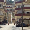 احراق وتحطيم محلات تجارية يملكها علويون في طرابلس بشمال لبنان