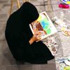 الأطفال يرسمون الفرح في الجناح الباكستاني