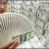 "الدولار" يسجل أدنى مستوى في شهرين