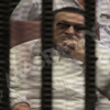 محامو أسر الشهداء يقتحمون قاعة ''محاكمة مبارك'' بعد منعهم من الدخول