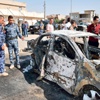 “داعش” يسيطر على معسكر عراقي وتفجيرات تدمي بغداد