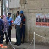 توجيه الناخبين شفهيًا ثمة أنصار''مرسي'' بلجان الهرم