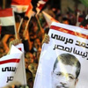 «الإخوان» يتظاهرون بالسويس رافعين صور فتيات «7 الصبح» و«مرسي»