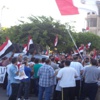 متظاهرو ''السيدة زينب'' يعترضون على رفع صور البرادعي بالمسيرة