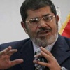 مرسي يصف انتقال السلطة بـ "اليوم الفارق"