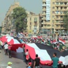 بالصور .. مسيرة مسجد مصطفي محمود تصل التحرير بعلم مصر طولة 100 متر