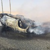 انقلاب واشتعال مركبة على طريق الوفرة
