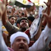 قتيل والالاف من مناصرين ومعارضين مرسي في شوارع القاهرة