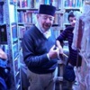 إحراق مكتبة يملكها كاهن في طرابلس لاتهامه بنشر كتابات مسيئة للنبي محمد