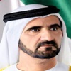 محمد بن راشد يمنح وشاحاً لأم الشهيد طارق الشحي