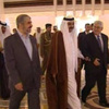 عباس التقى خالد مشعل برعاية قطرية