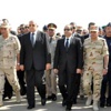 بالصور.. السيسى يتقدم جنازة شهداء سيناء