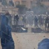 متظاهرو التحرير يحاولون فض الإشتباك أمام وزارة الداخلية