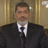 مرسي يهدد بإجراءات لحماية مصر