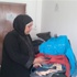 النضال الشعبي بطولكرم توزع ملابس للنساء الفقيرات
