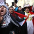 العشرات يهتفون في التحرير لإسقاط النظام العشرات يهتفون في التحرير لإسقاط النظام