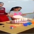 معلمة تشرح أركان الإسلام بالشمع المشتعل.. (فيديو)