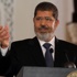 مرسي يوقع على قانون الصكوك مرسي يوقع على قانون الصكوك