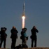 انطلاق المركبة سويوز الروسية تحمل ثلاثة رواد والشعلة الاولمبية الى الفضاء