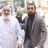 وصول أبو إسلام وابنه لنظر استئنافهما على قرار حبسهما