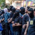 مناوشات بين الباعة الجائلين ومتظاهرين في شارع 26 يوليو