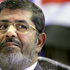 مرسي يهدد بالإضراب عن الطعام ويطلب لقاء الشاطر