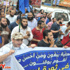 بالصور ..أسر الشهداء تصل ''التحرير'' ..والمتظاهرون يرفعون لافتات ''القرآن هو دستورنا''