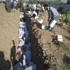 العثور على أشلاء من اثار مذبحة في صفائح قمامة في دوما العثور على أشلاء من اثار مذبحة في صفائح قمامة في دوما