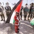 شهيد وجرحى في غزة وقمع مسيرة واعتقالات بالضفة