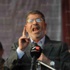 صحيفة إسبانية: مرسي أغضب العديد من المصريين بصلاحياته الواسعة