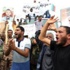 ليبيا : مسلحون يواصلون محاصرة وزارتين في طرابلس ويطالبون بتنحي رئيس الحكومة ليبيا : مسلحون يواصلون محاصرة وزارتين في طرابلس ويطالبون بتنحي رئيس الحكومة